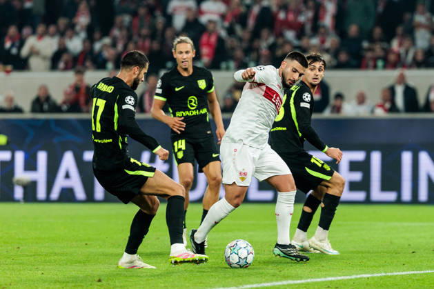 STUTTGART, GERMANY - OCTOBER 20: Deniz Undav (VfB Stuttgart, 26) controls the ball against David Hancko (Atletico de Madrid, 17), Marcos Llorente (Atletico de Madrid, 14) and Marc Pubill (Atletico de Madrid, 18) during the UEFA Champions League match between VfB Stuttgart vs. Atletico de Madrid at Arena Stuttgart on matchday 3 of the UEFA Champions League on October 20, 2026 in Stuttgart, Germany. Baden-Wuerttemberg Germany Copyright: xSteffiexWunderlx