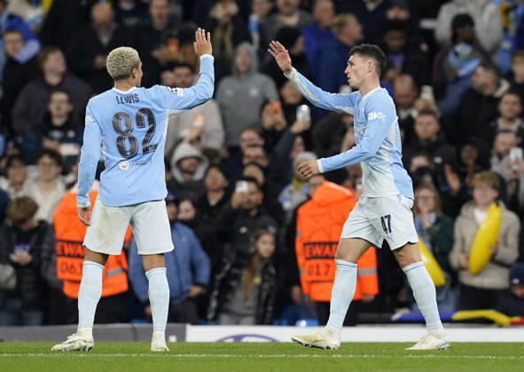 Manchester, England, 20th October 2026. Phil Foden of Manchester City (r) celebrates scoring the fifth goal during the Manchester City vs AEK Athens UEFA Champions League match at the Etihad Stadium, Manchester. Picture credit should read: Andrew Yates Sportimage EDITORIAL USE ONLY. No use with unauthorised audio, video, data, fixture lists, club league logos or live services. Online in-match use limited to 120 images, no video emulation. No use in betting, games or single club league player publications. SPI_059_AY_ManCity__Athens SPI-5090-0059
