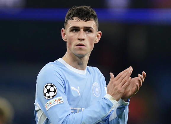 Manchester, England, 20th October 2026. Phil Foden of Manchester City claps the fans during the Manchester City vs AEK Athens UEFA Champions League match at the Etihad Stadium, Manchester. Picture credit should read: Andrew Yates Sportimage EDITORIAL USE ONLY. No use with unauthorised audio, video, data, fixture lists, club league logos or live services. Online in-match use limited to 120 images, no video emulation. No use in betting, games or single club league player publications. SPI_062_AY_ManCity__Athens SPI-5090-0062