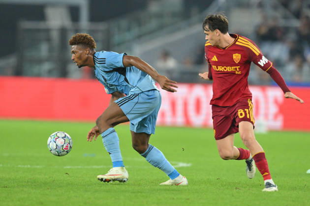 SOCCER - UEFA Champions League - AS Roma vs. Slovan Bratislava Photo by IPA ABACAPRESS.COM89963769 - Rahim Ibrahim of Slovan Bratislava under pressure from Niccolo Pisilli of Roma during the UEFA Champions League soccer match between Roma and Slovan Bratislava at the Olimpico Stadium on October 20, 2026, in Rome, Lazio. During the AS Roma vs. Slovan Bratislava UEFA Champions League soccer match in Rome, Italy, on October 20, 2026 Rome Italy  Copyright: xIPAxSport ABACAx