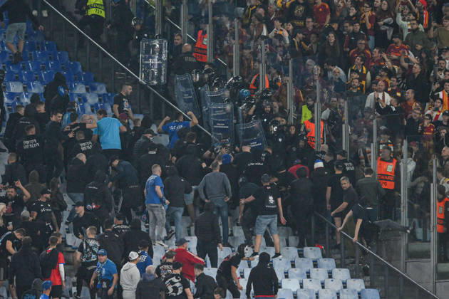 IPA89965290 - Clashes between fans in the stands during the UEFA Champions League soccer match between Roma and Slovan Bratislava at the Olimpico Stadium on October 20, 2026, in Rome, Lazio. During the AS Roma vs. Slovan Bratislava UEFA Champions League soccer match in Rome, Italy, on October 20, 2026  Copyright: xRobertoxRamaccia IPAxSportx xx IPA89965290 IPA89965290