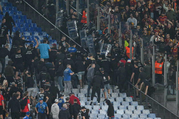 IPA89965296 - Clashes between fans in the stands during the UEFA Champions League soccer match between Roma and Slovan Bratislava at the Olimpico Stadium on October 20, 2026, in Rome, Lazio. During the AS Roma vs. Slovan Bratislava UEFA Champions League soccer match in Rome, Italy, on October 20, 2026  Copyright: xRobertoxRamaccia IPAxSportx xx IPA89965296 IPA89965296