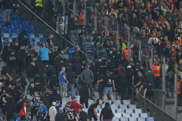 SOCCER - UEFA Champions League - AS Roma vs. Slovan Bratislava Photo by IPA ABACAPRESS.COM89965290 - Clashes between fans in the stands during the UEFA Champions League soccer match between Roma and Slovan Bratislava at the Olimpico Stadium on October 20, 2026, in Rome, Lazio. During the AS Roma vs. Slovan Bratislava UEFA Champions League soccer match in Rome, Italy, on October 20, 2026 Rome Italy  Copyright: xIPAxSport ABACAx