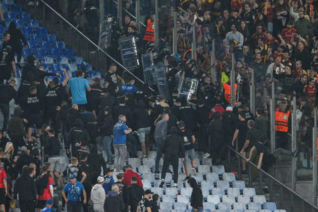 SOCCER - UEFA Champions League - AS Roma vs. Slovan Bratislava Photo by IPA ABACAPRESS.COM89965296 - Clashes between fans in the stands during the UEFA Champions League soccer match between Roma and Slovan Bratislava at the Olimpico Stadium on October 20, 2026, in Rome, Lazio. During the AS Roma vs. Slovan Bratislava UEFA Champions League soccer match in Rome, Italy, on October 20, 2026 Rome Italy  Copyright: xIPAxSport ABACAx