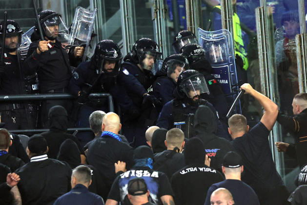 SOCCER - UEFA Champions League - AS Roma vs. Slovan Bratislava Photo by IPA ABACAPRESS.COM89965660 - Rome, Italy - October 20, 2026: Clashes between Bratislava fans and police during the 2026-2027 UEFA Champions League soccer match between AS Roma and SK Slovan Bratislava at the Olympic Stadium in Rome. Roma Italy  Copyright: xIPAxSport ABACAx