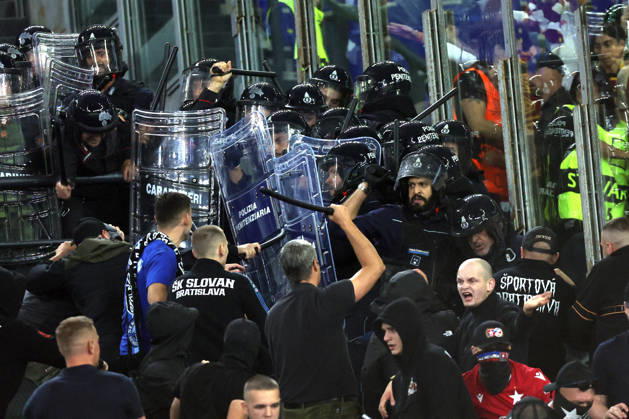 SOCCER - UEFA Champions League - AS Roma vs. Slovan Bratislava Photo by IPA ABACAPRESS.COM89965668 - Rome, Italy - October 20, 2026: Clashes between Bratislava fans and police during the 2026-2027 UEFA Champions League soccer match between AS Roma and SK Slovan Bratislava at the Olympic Stadium in Rome. Roma Italy  Copyright: xIPAxSport ABACAx
