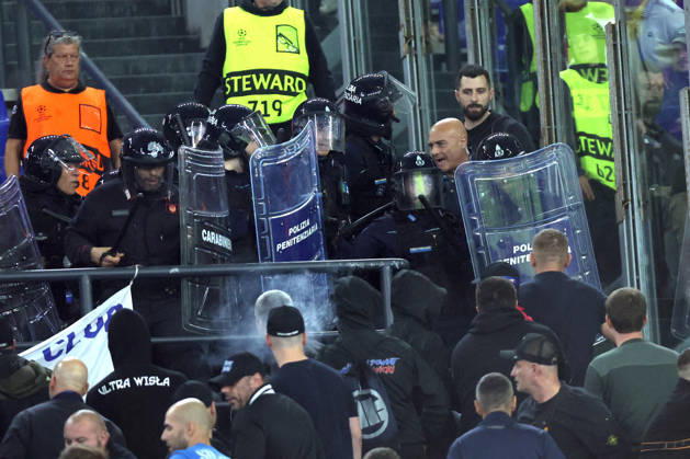 SOCCER - UEFA Champions League - AS Roma vs. Slovan Bratislava Photo by IPA ABACAPRESS.COM89965669 - Rome, Italy - October 20, 2026: Clashes between Bratislava fans and police during the 2026-2027 UEFA Champions League soccer match between AS Roma and SK Slovan Bratislava at the Olympic Stadium in Rome. Roma Italy  Copyright: xIPAxSport ABACAx