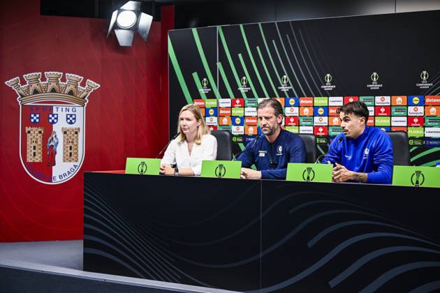 Tahnee Leece, communications manager of KAA Gent, Rik De Mil, head coach of KAA Gent and Tiago Araujo of KAA Gent pictured during a press conference, PK, Pressekonferenz of Belgian soccer team KAA Gent, Wednesday 21 October 2026 in Braga, Portugal. The team is preparing for the second match of the UEFA Conference League league phase against Portuguese SC Braga tomorrow. TOM GOYVAERTS TomxGoyvaerts  x190514949x