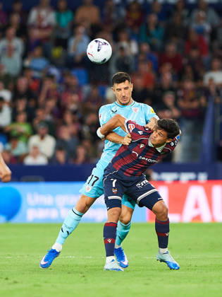 Yuri Berchiche (Athletic Club) and Roger Brugue (Levante UD) during the LaLiga EA Sports match between Levante UD and Athletic Club at Estadi Ciutat de València on October 21, 2026 in Valencia, Spain. -