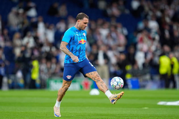 October 21, 2026, Madrid, Madrid, Spain: David Raum of RB Leipzig warms up during the UEFA Champions League 2026 27 League Phase MD3 match between Real Madrid CF and RB Leipzig at Bernabeu stadium on October 21, 2026, in Madrid, Spain. Madrid Spain - ZUMAa181 20261021_zaa_a181_046 Copyright: xDennisxAgyemanx