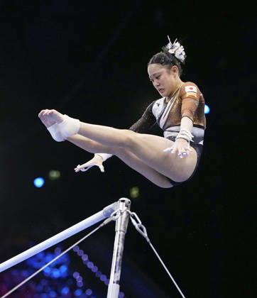 Artistic Gymnastics: World championships Misa Nishiyama of Japan competes on the uneven bars during the women s team all-around final at the artistic gymnastics world championships in Rotterdam on Oct. 21, 2026.  A14AA0005631433P