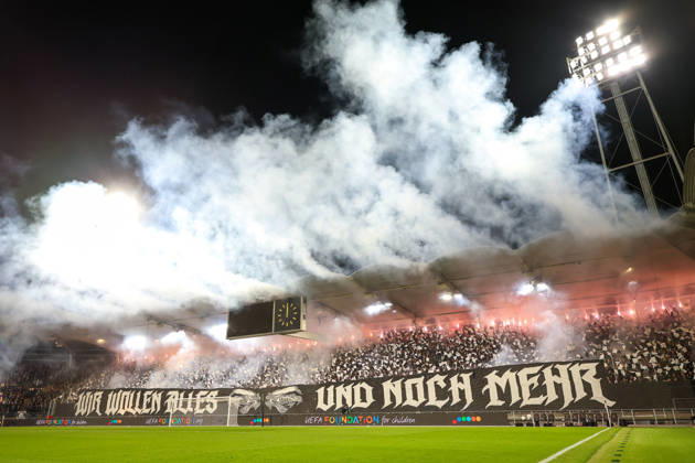 SOCCER - UEFA EL, Sturm vs Marseille GRAZ,AUSTRIA,22.OCT.26 - SOCCER - UEFA Europa League, SK Sturm Graz vs Olympique de Marseille. Image shows fans (Sturm) with a choreography and pyrotechnics.  GEPAxpictures xChrisxBauer
