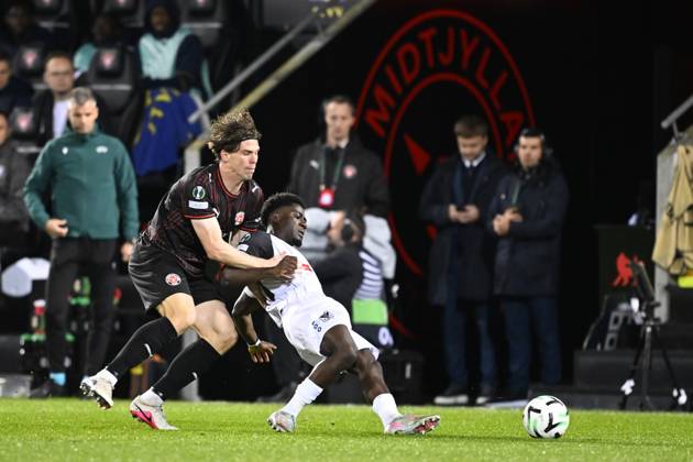 FC Midtjylland v Sint-Truidense VV - UEFA Conference League HERNING, DENMARK - OCTOBER 22 : Bech Mads defender of Midtjylland and Mbuku Nathanael forward of Sint-Truidense VV during the UEFA Conference League 2026 27 League Phase matchday 2 match between FC Midtjylland and Sint-Truidense VV on October 22, 2026 in Herning, Denmark, 22 10 2026 Herning Denmark  Copyright: xTomasxSiskx