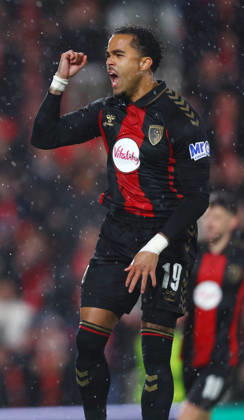 Bournemouth, England, 22nd October 2026. Justin Kluivert of Bournemouth celebrates scoring the first goal during the AFC Bournemouth vs AC Milan UEFA Europa League match at the Vitality Stadium, Bournemouth. Picture credit should read: Paul Terry Sportimage EDITORIAL USE ONLY. No use with unauthorised audio, video, data, fixture lists, club league logos or live services. Online in-match use limited to 120 images, no video emulation. No use in betting, games or single club league player publications. SPI_016_PT_Bournmouthmouth_AC_Milan SPI-5092-0016