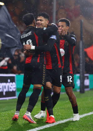 Bournemouth, England, 22nd October 2026. Justin Kluivert of Bournemouth celebrates scoring the first goal with Evanilson of Bournemouth during the AFC Bournemouth vs AC Milan UEFA Europa League match at the Vitality Stadium, Bournemouth. Picture credit should read: Paul Terry Sportimage EDITORIAL USE ONLY. No use with unauthorised audio, video, data, fixture lists, club league logos or live services. Online in-match use limited to 120 images, no video emulation. No use in betting, games or single club league player publications. SPI_020_PT_Bournmouthmouth_AC_Milan SPI-5092-0020