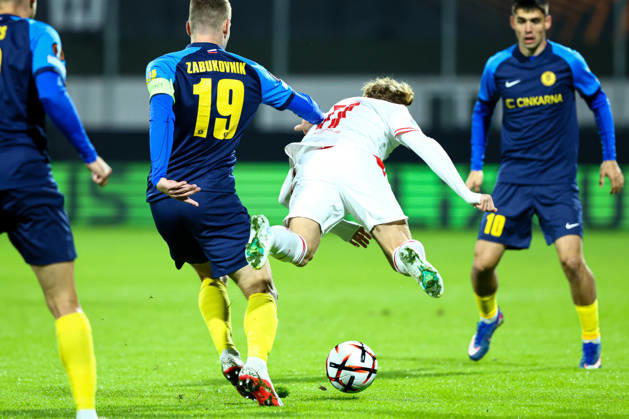 SOCCER - UEFA EL, Celje vs RBS CELJE,SLOVENIA,22.OCT.26 - SOCCER - UEFA Europa League, NK Celje vs Red Bull Salzburg. Image shows Mark Zabukovnik (Celje) and Yorbe Vertessen (Salzburg).  GEPAxpictures xJamesxDoak