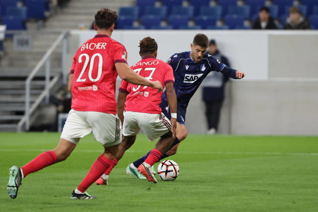 Sinsheim, Germany - Octobre 22: Felix Bacher (Olympique Lyon), Steeve Kango (Olympique Lyonnais), Andrej Kramaric (TSG 1899 Hoffenheim) in action, with the ball during the UEFA Europa League phase Matchday 3 2026 27 match between TSG Hoffenheim and Olympique Lyon at Rhein Neckar Arena on Octobre, 2026 in Sinsheim, Germany Copyright: HMBxMedia JoaquimxFerreira