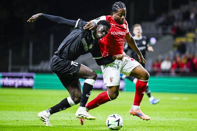 IbrahimÐ° Cisse of KAA Gent and Bright Arrey-Mbi of SC Braga pictured in action during a soccer game between Portuguese SC Braga and Belgian soccer team KAA Gent, Thursday 22 October 2026 in Braga, Portugal, the second match in the UEFA Conference League league phase. TOM GOYVAERTS TomxGoyvaerts  x190689982x