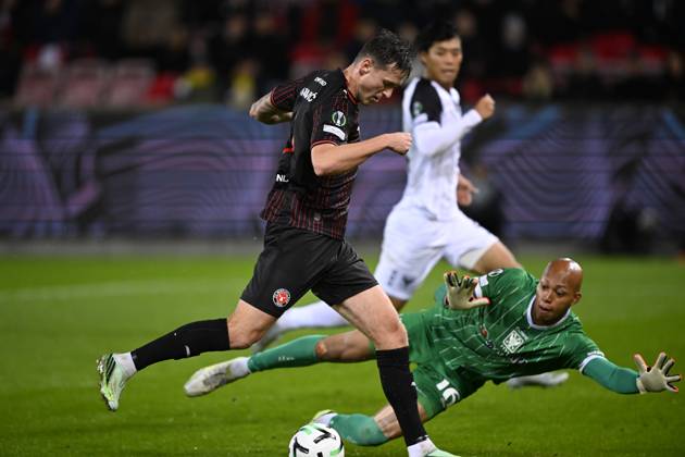 FC Midtjylland v Sint-Truidense VV - UEFA Conference League HERNING, DENMARK - OCTOBER 22 : Rajovic Mileta forward of Midtjylland and Kokubo Leo goalkeeper of Sint-Truidense VV during the UEFA Conference League 2026 27 League Phase matchday 2 match between FC Midtjylland and Sint-Truidense VV on October 22, 2026 in Herning, Denmark, 22 10 2026 Herning Denmark  Copyright: xTomasxSiskx