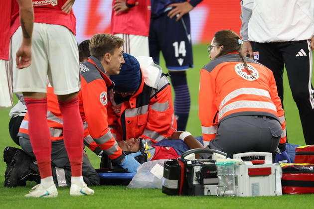 Sinsheim, Germany - Octobre 22: Steeve Kango (Olympique Lyonnais) being treated for an injury on the ground during the UEFA Europa League phase Matchday 3 2026 27 match between TSG Hoffenheim and Olympique Lyon at Rhein Neckar Arena on Octobre, 2026 in Sinsheim, Germany Copyright: HMBxMedia JoaquimxFerreira