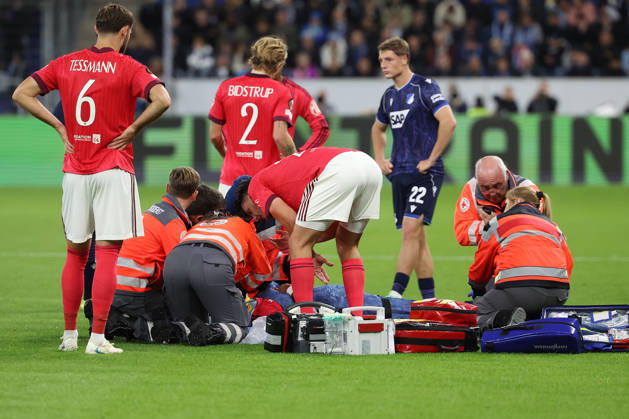 Sinsheim, Germany - Octobre 22: Steeve Kango (Olympique Lyonnais) being treated for an injury on the ground during the UEFA Europa League phase Matchday 3 2026 27 match between TSG Hoffenheim and Olympique Lyon at Rhein Neckar Arena on Octobre, 2026 in Sinsheim, Germany Copyright: HMBxMedia JoaquimxFerreira