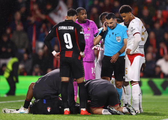 Bournemouth v AC Milan 22 October 2026, Bournemouth - UEFA Europa League - Bournemouth v AC Milan - Referee Vasilis Fotias touches his ear as he awaits a verdict on a red card from the VAR team - Photo: Jacques Feeney Offside. Bournemouth UK Copyright: xJacquesxFeeneyx xOffsidexOffside