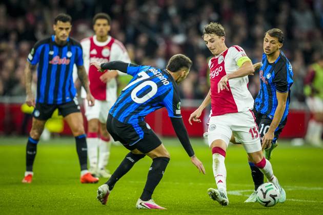 AMSTERDAM , 22-10-2026 , JohanCruijff ArenA , season 2026 2027 , UEFA Conference League , League phase - Matchday 3 football , match between Ajax and Atalanta , Picture shows Atalanta player Lazar Vujadin Samardzic and Ajax player Youri Baas Ajax - Atalanta  x208964726x Copyright: