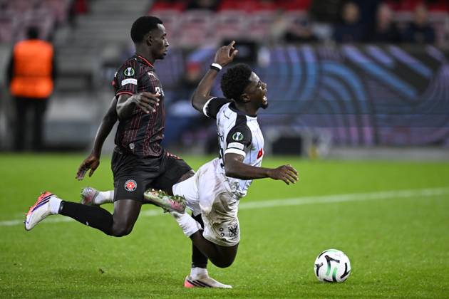 FC Midtjylland v Sint-Truidense VV - UEFA Conference League HERNING, DENMARK - OCTOBER 22 : Ndiaye Abdou Aziz defender of Midtjylland and Mbuku Nathanael forward of Sint-Truidense VV during the UEFA Conference League 2026 27 League Phase matchday 2 match between FC Midtjylland and Sint-Truidense VV on October 22, 2026 in Herning, Denmark, 22 10 2026 Herning Denmark  Copyright: xTomasxSiskx