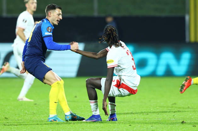SOCCER - UEFA EL, Celje vs RBS CELJE,SLOVENIA,22.OCT.26 - SOCCER - UEFA Europa League, NK Celje vs Red Bull Salzburg. Image shows Mario Kvesic (Celje) and Gaoussou Diakite (RBS).  GEPAxpictures xJamesxDoak