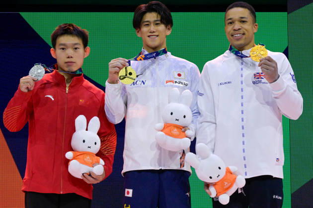 Daiki Hashimoto from Japan (center), Haonan Yang from China (left) and Joe Fraser from Great Britain (right) celebrate finishing first, second and third respectively in the Men All-round finals at the 54th Artistic Gymnastics World Championships, on 22 October 2026 at Rotterdam Ahoy, Rotterdam, the Netherlands. Noxthirdxpartyxsales,xHOLLANDxOUT  aflo_358243696 RichardxHuisxinxtxVeldx