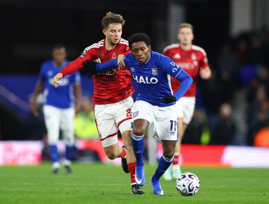 Ipswich, England, 23rd October 2026. James McAtee of Nottingham Forest (l) tussle with Jaden Philogene-Bidace of Ipswich Town (r) during the Ipswich Town vs Nottingham Forest Premier League match at Portman Road, Ipswich. Picture credit should read: Paul Terry Sportimage EDITORIAL USE ONLY. No use with unauthorised audio, video, data, fixture lists, club league logos or live services. Online in-match use limited to 120 images, no video emulation. No use in betting, games or single club league player publications. SPI_010_PT_Ipswich_Forest SPI-5093-0011
