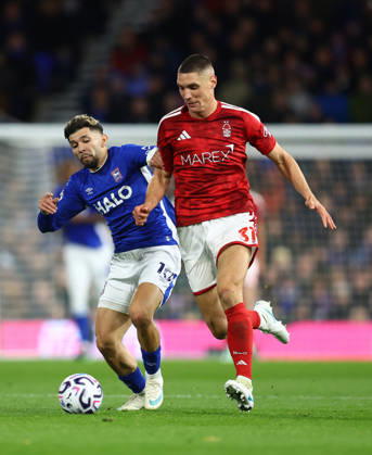 Ipswich, England, 23rd October 2026. Julio Enciso of Ipswich Town tackles Nikola Milenkovic of Nottingham Forest to break away and score the equalising goal during the Ipswich Town vs Nottingham Forest Premier League match at Portman Road, Ipswich. Picture credit should read: Paul Terry Sportimage EDITORIAL USE ONLY. No use with unauthorised audio, video, data, fixture lists, club league logos or live services. Online in-match use limited to 120 images, no video emulation. No use in betting, games or single club league player publications. SPI_024_PT_Ipswich_Forest SPI-5093-0025