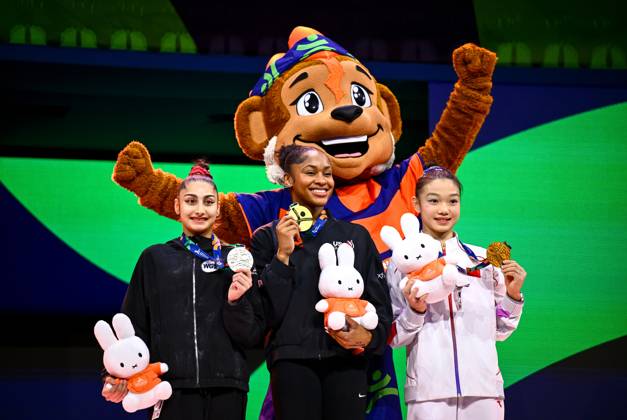 Netherlands Artistic Gymnastics World Championships 9271458 23.10.2026 Silver medalist Liudmila Roshchina of Team World Gymnastics Neutral Athletes 2, gold medalist Skye Blakely of the United States and bronze medalist China s Ke Qinqin celebrate on the podium during the awarding ceremony following the women s individual all-around final at the 2026 World Artistic Gymnastics Championships in Rotterdam, the Netherlands. Alexey Filippov Sputnik Rotterdam Netherlands  Copyright: xAlexeyxFilippovx