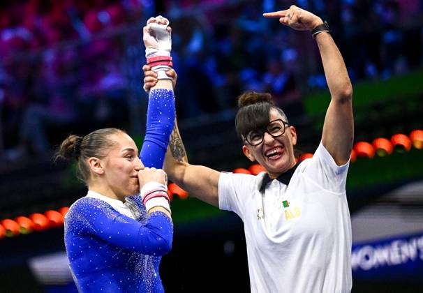 Netherlands Artistic Gymnastics World Championships 9272108 24.10.2026 Algeria s Kaylia Nemour reacts with her coach Nadia Masse after competing in the women s uneven bars final at the 2026 World Artistic Gymnastics Championships in Rotterdam, the Netherlands. Alexey Filippov Sputnik Rotterdam Netherlands  Copyright: xAlexeyxFilippovx