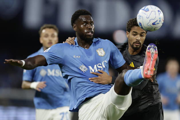 Italy: Serie a football match SSC Napoli vs AS Roma Napoli s French defender Benoit Badiashile challenges for the ball with Roma™s Dutch defender Devyne Rensch during the Serie A football match between SSC Napoli and AS Roma at the Diego Armando Maradona Stadium in Naples, October 24, 2026. _BPH5472 Copyright: xAntonioxBalascox