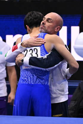 OTHER - Gymnastics - 54th Artistic Gymnastics World Championships Photo by IPA ABACAPRESS.COM90122708 - Gabriele TARGHETTA (ITA) after his pommel horse routine with his coach during the 54th Artistic Gymnastics World Championships in Rotterdam, Netherlands, on October 24, 2026 Rotterdam Netherlands  Copyright: xIPAxSport ABACAx