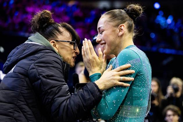 ROTTERDAM - Kaylia Nemour (ALG) receives congratulations after winning the balance beam apparatus final at the World Gymnastics Championships in Rotterdam Ahoy. IRIS VAN DEN BROEK ANP xVIxANPxSportx xxANPxIVx 573609540 originalFilename: 573609540.jpg