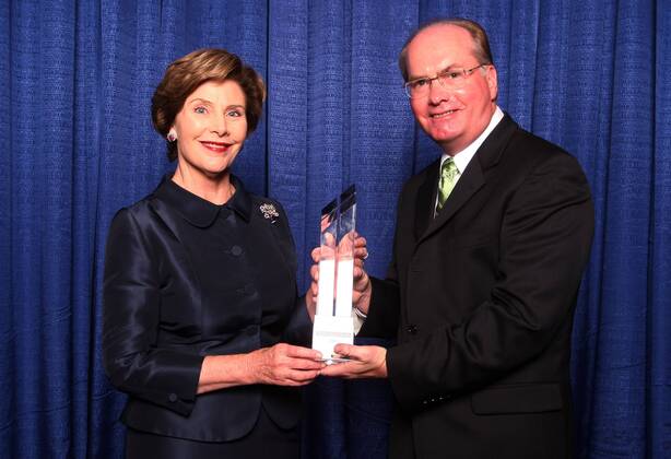 Former First Lady Laura Bush accepts the 2009 Alvin K. Stolze International Humanitarian Award from Mark Stolze, President & CEO of the National Children s Cancer Society at their annual awards dinner in St. Louis on September 26, 2009. UPI Bill Greenblatt Former First Lady Laura in St. Louis to receive Children s Cancer award  SLP2009092604