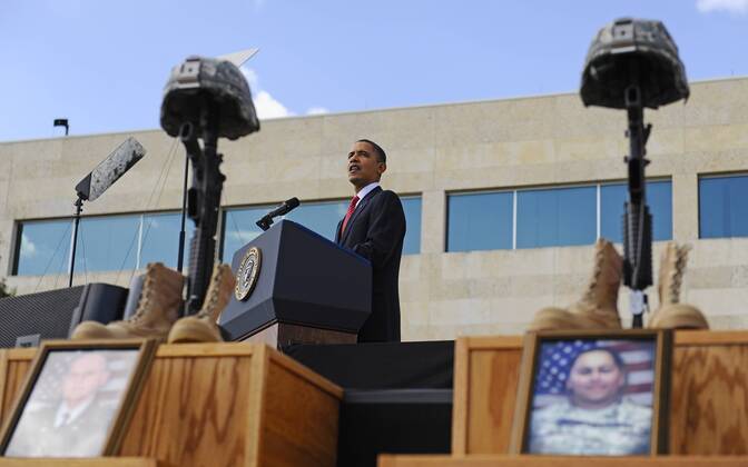 U.S. President Barack Obama speaks at the memorial service for the 12 soldiers and one civilian killed at Fort Hood U.S Army Post near Killeen, Texas, November 10, 2009. Army Major Malik Nadal Hasan reportedly shot and killed 13 people, 12 soldiers and one civilian, and wounded 30 others in a rampage on November 5 at the base s Soldier Readiness Center where deploying and returning soldiers undergo medical screenings.  WAX20091111514