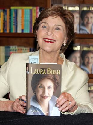 Former First Lady Laura Bush sign books during an event to promote her memoirs Spoken from the Heart at Books and Books in Coral Gables Florida on May 28, 2010.  MIA2010052818
