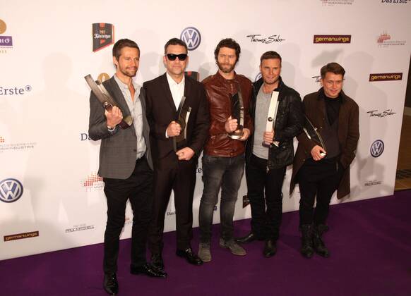 Take That - L-R: Jason Orange, Robbie Williams, Howard Donald, Gary Barlow, Mark Owen, bei der Verleihung vom Musikpreis Echo in Berlin am 24.03.2011 Echo Verleihung 2011 