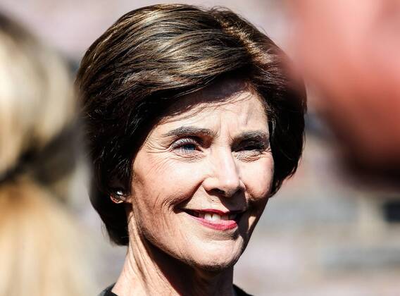 Oct. 27, 2012 - Dallas, Texas, U.S. - Former First Lady LAURA BUSH participates in the pre game coin toss before the game between the Memphis Tigers and the Southern Methodist Mustangs at the Gerald J. Ford Stadium in Dallas, Texas. SMU defeats Memphis 44 to 13. Dallas U.S. - ZUMAw30