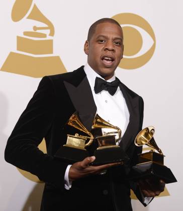 Jay-Z appears backstage with the Grammys he won at the 55th Grammy Awards at the Staples Center in Los Angeles on February 10, 2013.  LAP20130210283
