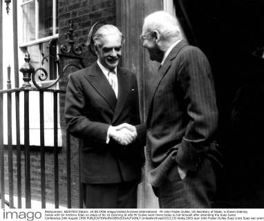 Mr John Foster Dulles, US Secretary of State, is shown shaking hands with Sir Anthony Eden on steps of No 10 Downing St afte Mr Dulles went there today to bid farewell after attending the Suez Canal Conference 24th August 1956  UnitedArchives01011133