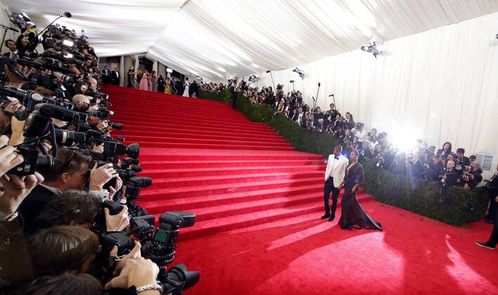 Jay-Z and Beyonce arrive on the red carpet at the Costume Institute Benefit celebrating the opening of Charles James: Beyond Fashion and the new Anna Wintour Costume Center at the Metropolitan Museum of Art in New York City on May 5, 2014.  NYP20140505121