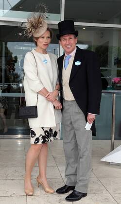 Image Licensed to i-Images Picture Agency. 07 06 2014. Sebastian Coe and wife arriving at the Epsom Derby in Epsom, United Kingdom. Picture by Stephen Lock i-Images StephenxLockx xi-Images IIM-2411-0011