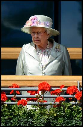 Image ©Licensed to i-Images Picture Agency. 18 06 2014. Ascot, United Kingdom. HM The Queen with Prince Andrew and Prince Edward watch the race horse s in the parade ring for 3rd race The Prince of wales Stakes on Day 2 of Royal Ascot at Ascot Racecourse. AndrewxParsonsx xi-Images IIM-2483-0038