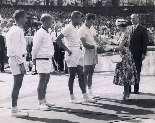 Jul 05, 1957 - London, England, United Kingdom - QUEEN ELIZABETH II presents trophies to the winners of the Men s Doubles Final BUDGE PATTY and GARDNAR MULLOY wile NEALE FRASER and LEW HOAD watch.. London United Kingdom - ZUMAk09
