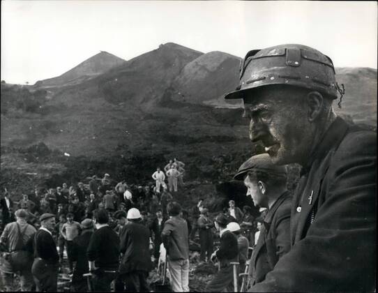 Oct. 10, 1966 - 100 children found in Disaster at Aberfan. So far 107 bodies - 100 of them children have been recovered from the slime-covered wreckage of the crushed village school at Aberfan, near Merthr Tydfil, following yesterday s coat tip avalnache. Photo shows Rescue workers seen at the scene of the disaster at Aberfan.  - ZUMAk09