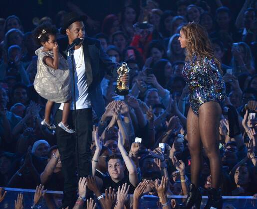 Blue Ivy Carter, Jay-Z and Beyonce accept the Video Vanguard Award at the 2014 MTV Video Music Awards at the Forum in Inglewood, California on August 24, 2014.  LAP20140824219